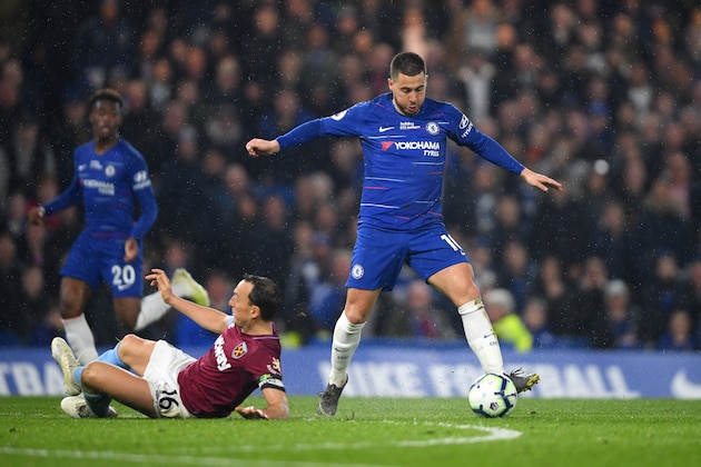 LONDON, ENGLAND - APRIL 08:  Eden Hazard of Chelsea ievades Mark Noble of West Ham United during the Premier League match between Chelsea FC and West Ham United at Stamford Bridge on April 08, 2019 in London, United Kingdom. (Photo by Mike Hewitt/Getty Images)