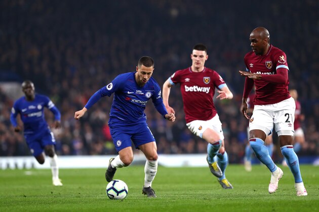 LONDON, ENGLAND - APRIL 08: Eden Hazard of Chelsea FC and Angelo Ogbonna of West Ham United in action during the Premier League match between Chelsea FC and West Ham United at Stamford Bridge on April 8, 2019 in London, England. (Photo by Chloe Knott - Danehouse/Getty Images)