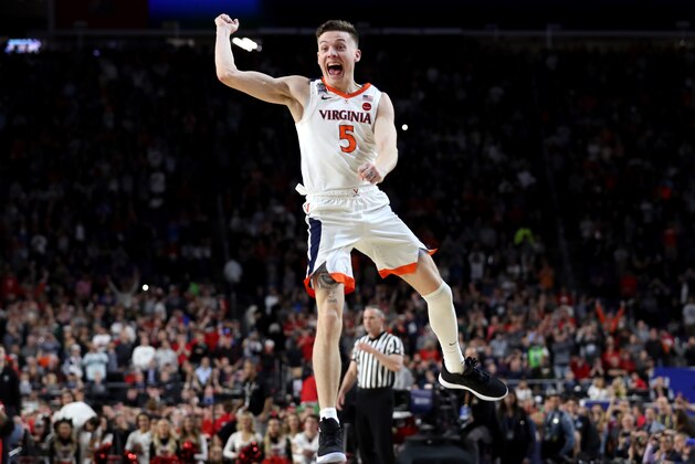 MINNEAPOLIS, MINNESOTA - APRIL 08:  Kyle Guy #5 of the Virginia Cavaliers celebrate his teams 85-77 win over the Texas Tech Red Raiders to win the the 2019 NCAA men's Final Four National Championship game at U.S. Bank Stadium on April 08, 2019 in Minneapolis, Minnesota. (Photo by Streeter Lecka/Getty Images)
