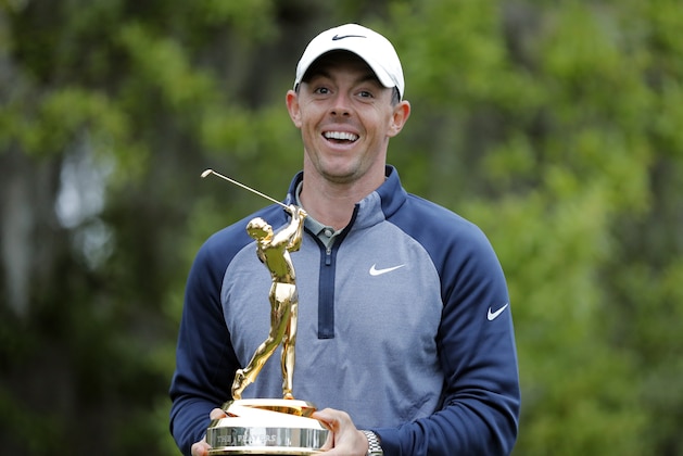Rory McIlroy, of Northern Ireland, poses with the trophy after winning The Players Championship golf tournament Sunday, March 17, 2019, in Ponte Vedra Beach, Fla. (AP Photo/Gerald Herbert)