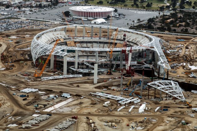 Aerial shot taken over the new Los Angeles Stadium under construction in Hollywood Park, Inglewood, California, near Los Angeles, 20 February, 2019. - The stadium, which is slated to open in 2020, will be home to the Los Angeles Rams and the Los Angeles Chargers of the National Football League. It is also scheduled to host Super Bowl LVI in February 2022. (Photo by Daniel SLIM / AFP)        (Photo credit should read DANIEL SLIM/AFP/Getty Images)