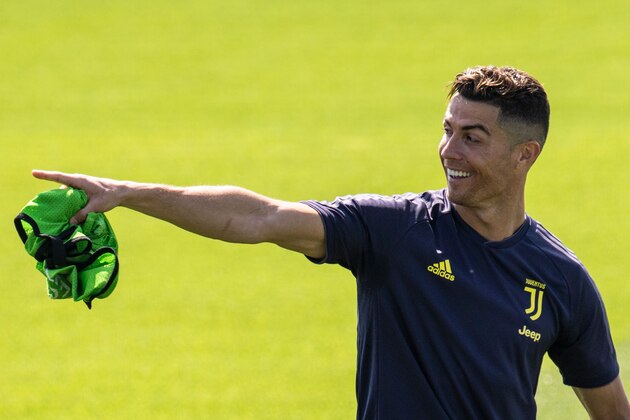 Juventus' Portuguese forward Cristiano Ronaldo attends a training session on the eve of the UEFA Champions League football match Ajax vs Juventus on April 9, 2019 at the Juventus Training Center in Turin. (Photo by MARCO BERTORELLO / AFP)        (Photo credit should read MARCO BERTORELLO/AFP/Getty Images)