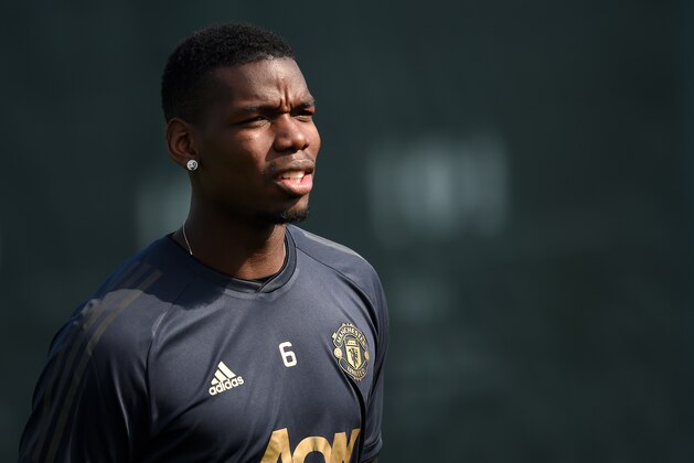 MANCHESTER, ENGLAND - APRIL 09: Paul Pogba of Manchester United walks out to train during the Manchester United training session ahead of the UEFA Champions League Quarter Final First Leg match between Manchester United v FC Barcelona at Aon Training Complex on April 09, 2019 in Manchester, England. (Photo by Nathan Stirk/Getty Images)