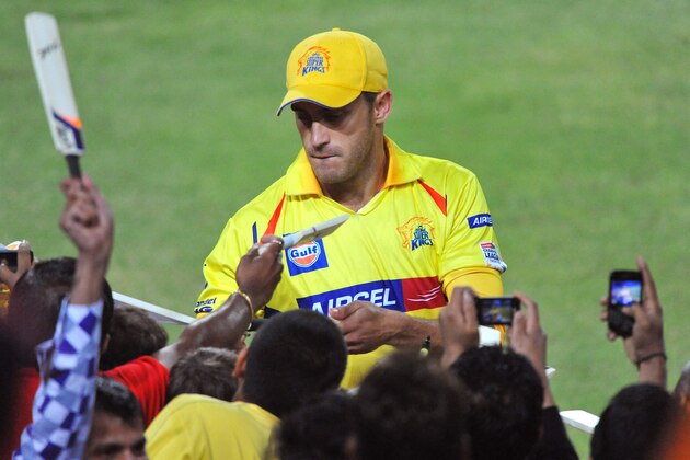 JOHANNESBURG, SOUTH AFRICA - OCTOBER 20: Faf du Plessis of CSK signs bats on the boundary during the Karbonn Smart CLT20 match between Chennai Super Kings and Mumbai Indians at Bidvest Wanderers Stadium on October 20, 2012 in Johannesburg, South Africa. (Photo by Duif du Toit / Gallo Images/Getty Images)