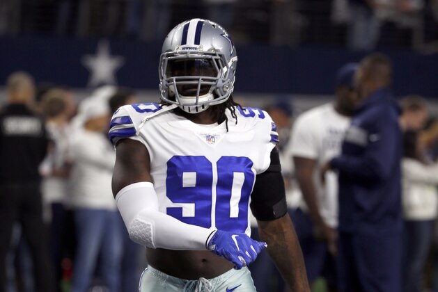 Dallas Cowboys defensive end DeMarcus Lawrence (90) warms up before an NFC wild-card NFL football game against the Seattle Seahawks in Arlington, Texas, Saturday, Jan. 5, 2019.(AP Photo/Ron Jenkins)