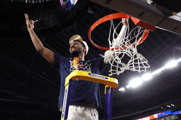 MINNEAPOLIS, MINNESOTA - APRIL 08:  Braxton Key #2 of the Virginia Cavaliers cuts the net down after his teams 85-77 win over the Texas Tech Red Raiders in the 2019 NCAA men's Final Four National Championship game at U.S. Bank Stadium on April 08, 2019 in Minneapolis, Minnesota. (Photo by Streeter Lecka/Getty Images)