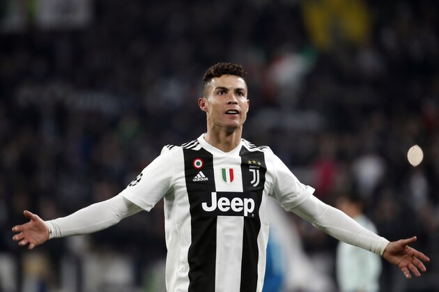 Juventus' Cristiano Ronaldo celebrates at the end of the Champions League round of 16, 2nd leg, soccer match between Juventus and Atletico Madrid at the Allianz stadium in Turin, Italy, Tuesday, March 12, 2019. Ronaldo scored the three goals in Juventus 3-0 win.(AP Photo/Antonio Calanni)