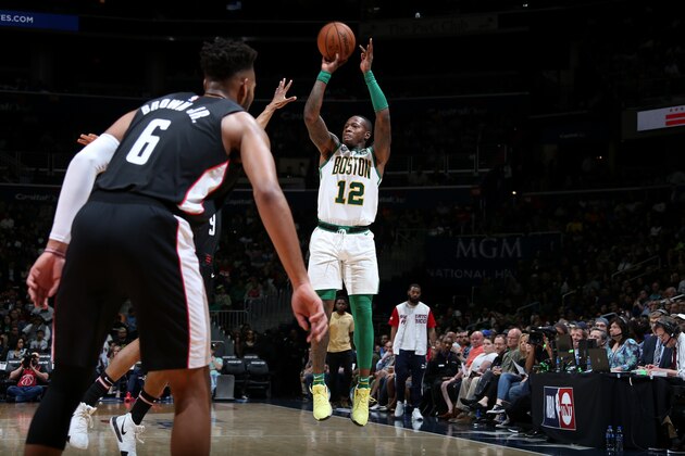WASHINGTON, DC - APRIL 9: Terry Rozier #12 of the Boston Celtics shoots the ball against the Washington Wizards  on April 9, 2019 at Capital One Arena in Washington, DC. NOTE TO USER: User expressly acknowledges and agrees that, by downloading and or using this Photograph, user is consenting to the terms and conditions of the Getty Images License Agreement. Mandatory Copyright Notice: Copyright 2019 NBAE (Photo by Stephen Gosling/NBAE via Getty Images)