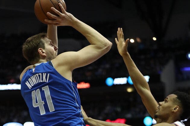 DALLAS, TEXAS - APRIL 09:  Dirk Nowitzki #41 of the Dallas Mavericks takes a shot against the Phoenix Suns in the second quarter at American Airlines Center on April 09, 2019 in Dallas, Texas.  NOTE TO USER: User expressly acknowledges and agrees that, by downloading and or using this photograph, User is consenting to the terms and conditions of the Getty Images License Agreement. (Photo by Ronald Martinez/Getty Images)