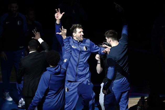 Dallas Mavericks' Dirk Nowitzki (41) is introduced for the team's NBA basketball game against the Phoenix Suns in Dallas, Tuesday, April 9, 2019. (AP Photo/Tony Gutierrez)