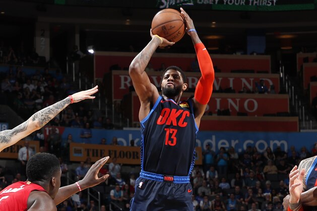 OKLAHOMA CITY, OK - APRIL 9: Paul George #13 of the Oklahoma City Thunder shoots three point basket aHouston Rockets on April 9, 2019 at Chesapeake Energy Arena in Oklahoma City, OK. NOTE TO USER: User expressly acknowledges and agrees that, by downloading and or using this photograph, User is consenting to the terms and conditions of the Getty Images License Agreement. Mandatory Copyright Notice: Copyright 2019 NBAE (Photo by Jeff Haynes/NBAE via Getty Images)