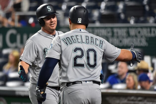 KANSAS CITY, MISSOURI - APRIL 08:  Jay Bruce #32 of the Seattle Mariners celebrates his home run with Daniel Vogelbach #20 in the eighth inning against the Kansas City Royals at Kauffman Stadium on April 08, 2019 in Kansas City, Missouri. (Photo by Ed Zurga/Getty Images)