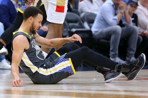 NEW ORLEANS, LOUISIANA - APRIL 09: Stephen Curry #30 of the Golden State Warriors reacts after falling down during the first half against the New Orleans Pelicans at the Smoothie King Center on April 09, 2019 in New Orleans, Louisiana. NOTE TO USER: User expressly acknowledges and agrees that, by downloading and or using this photograph, User is consenting to the terms and conditions of the Getty Images License Agreement. (Photo by Jonathan Bachman/Getty Images)
