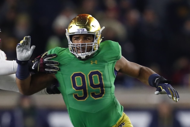 Notre Dame defensive lineman Jerry Tillery (99) rushes against Florida State in the first half of an NCAA college football game in South Bend, Ind.,Saturday, Nov. 10, 2018. (AP Photo/Paul Sancya)
