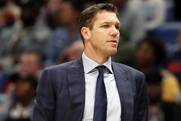 Los Angeles Lakers head coach Luke Walton reacts to a call during the first half of an NBA basketball game against the New Orleans Pelicans in New Orleans, Sunday, March 31, 2019. The Lakers won 130-102. (AP Photo/Tyler Kaufman)