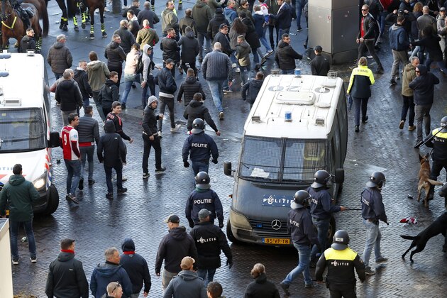 police with Ajax fans during the UEFA Champions League quarter final match Ajax Amsterdam and Juventus FC at the Johan Cruijff Arena on April 10, 2019 in Amsterdam, The Netherlands(Photo by VI Images via Getty Images)