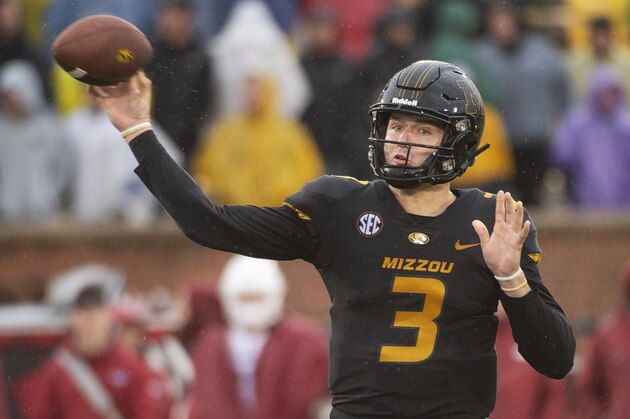 Missouri quarterback Drew Lock throws the ball during the first half of an NCAA college football game against Arkansas Friday, Nov. 23, 2018, in Columbia, Mo. (AP Photo/L.G. Patterson)