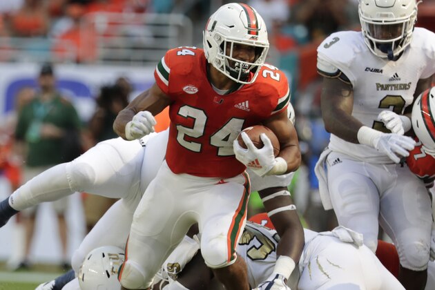 Miami running back Travis Homer (24) runs during the first half of an NCAA college football game against FIU, Saturday, Sept. 22, 2018, in Miami Gardens, Fla. (AP Photo/Lynne Sladky)