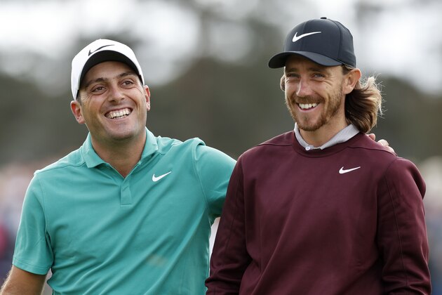 TADWORTH, ENGLAND - OCTOBER 11:  Francesco Molinari of Italy (left) and Tommy Fleetwood of England (right) reacts on the 2nd green during Day One of Sky Sports British Masters at Walton Heath Golf Club on October 11, 2018 in Tadworth, England.  (Photo by Luke Walker/Getty Images)