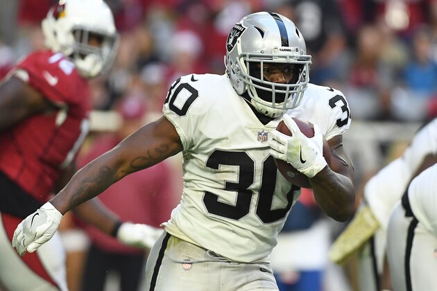 GLENDALE, AZ - NOVEMBER 18:  Jalen Richard #30 of the Oakland Raiders carries in the first half of the NFL game against the Arizona Cardinals at State Farm Stadium on November 18, 2018 in Glendale, Arizona.  (Photo by Jennifer Stewart/Getty Images)