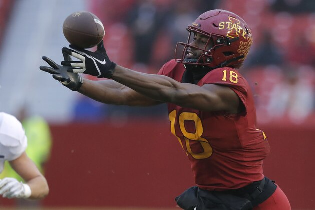 Iowa State wide receiver Hakeem Butler tries to make a reception in front of Drake defensive back Will Warner, left, during the first half of an NCAA college football game, Saturday, Dec. 1, 2018, in Ames, Iowa. The pass fell incomplete. (AP Photo/Charlie Neibergall)