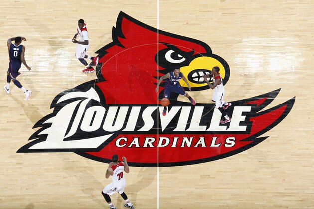LOUISVILLE, KY - MARCH 8: General view of the Louisville Cardinals logo at midcourt as action takes place during the game against the Connecticut Huskies at KFC Yum! Center on March 8, 2014 in Louisville, Kentucky. Louisville won 81-48 to clinch a share of the American Athletic Conference championship. (Photo by Joe Robbins/Getty Images)