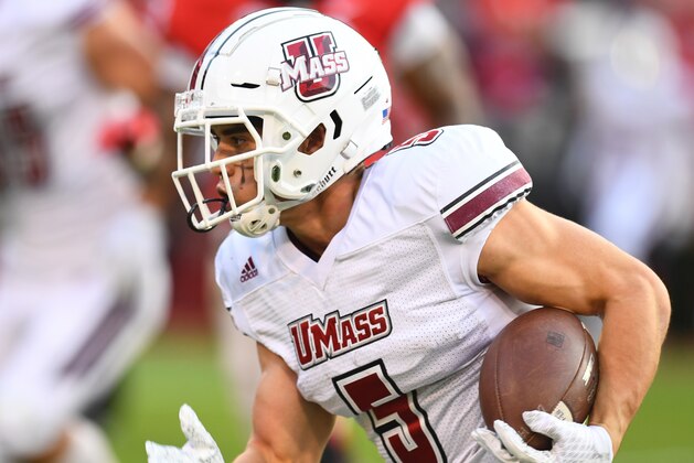 ATHENS, GA - NOVEMBER 17: Andy Isabella #5 of the Massachusetts Minutemen carries the ball during the first quarter against the Georgia Bulldogs on November 17, 2018 at Sanford Stadium in Athens, Georgia. (Photo by Scott Cunningham/Getty Images)