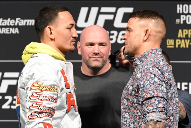 LAS VEGAS, NV - MARCH 1:  (L-R) Opponents Max Holloway and Dustin Poirier face off during the UFC 236 Press Conference inside T-Mobile Arena on March 1, 2019 in Las Vegas, Nevada. (Photo by Jeff Bottari/Zuffa LLC/Zuffa LLC via Getty Images)