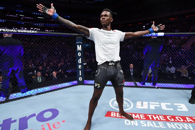 NEW YORK, NY - NOVEMBER 03:  Israel Adesanya of Nigeria celebrates his TKO victory over Derek Brunson in their middleweight bout during the UFC 230 event inside Madison Square Garden on November 3, 2018 in New York, New York. (Photo by Jeff Bottari/Zuffa LLC/Zuffa LLC via Getty Images)
