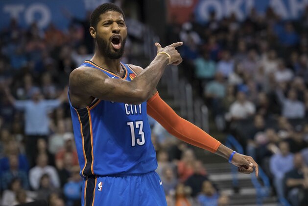 Oklahoma City Thunder forward Paul George (13) questions a call during the second half of the team's NBA basketball game against the Indiana Pacers on Wednesday, March 27, 2019, in Oklahoma City. (AP Photo/Rob Ferguson)