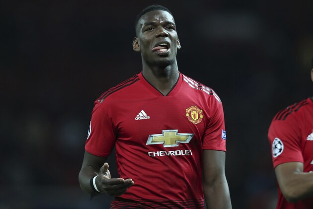 Manchester United's Paul Pogba reacts after the Champions League quarterfinal, first leg, soccer match between Manchester United and FC Barcelona at Old Trafford stadium in Manchester, England, Wednesday, April 10, 2019. Barcelona won 1-0. (AP Photo/Jon Super)
