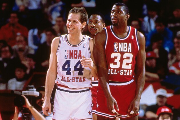 CHICAGO, IL - 1988: Magic Johnson #32 of the Western Conference stands against Danny Ainge #44 of the Eastern Conference during the 1988 NBA All-Star Game on February 7, 1988 at the Chicago Stadium, Chicago, Illinois. NOTE TO USER: User expressly acknowledges and agrees that, by downloading and or using this photograph, User is consenting to the terms and conditions of the Getty Images License Agreement. Mandatory Copyright Notice: Copyright 1988 NBAE (Photo by Andrew D. Bernstein/NBAE via Getty Images)