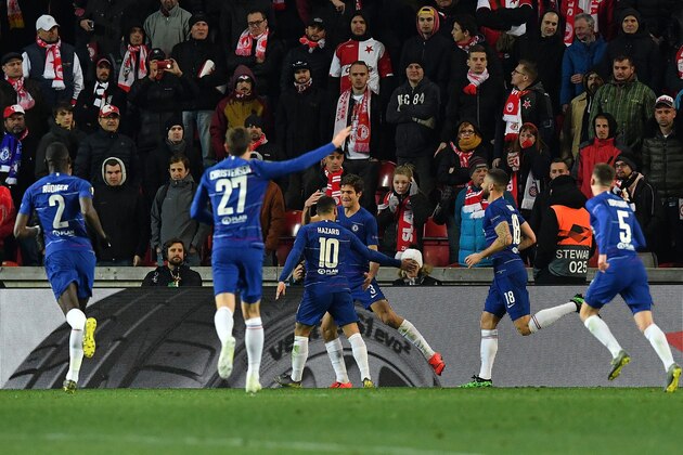 Chelsea's Spanish defender Marcos Alonso (C) celebrates scoring the opening goal with his teammates during the UEFA Europa League quarter-final, first leg, football match Slavia Prague v Chelsea FC in Prague on April 11, 2019. (Photo by JOE KLAMAR / AFP)        (Photo credit should read JOE KLAMAR/AFP/Getty Images)