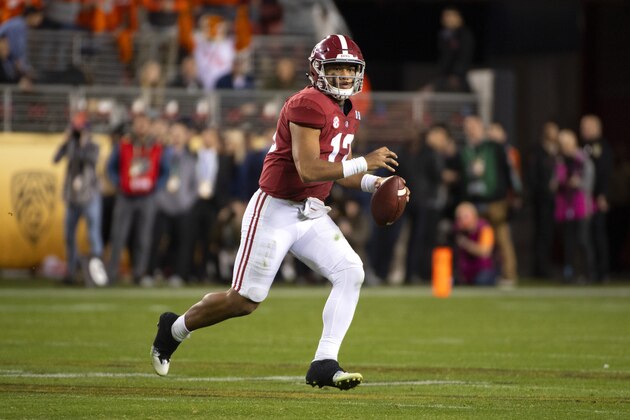 SANTA CLARA, CA - JANUARY 07: Tua Tagovailoa #13 of the Alabama Crimson Tide makes a pass against the Clemson Tigers during the College Football Playoff National Championship held at Levi's Stadium on January 7, 2019 in Santa Clara, California. The Clemson Tigers defeated the Alabama Crimson Tide 44-16. (Photo by Jamie Schwaberow/Getty Images)