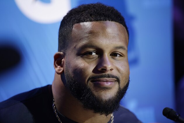 Los Angeles Rams' Aaron Donald smiles during Opening Night for the NFL Super Bowl 53 football game Monday, Jan. 28, 2019, in Atlanta. (AP Photo/Matt Rourke)