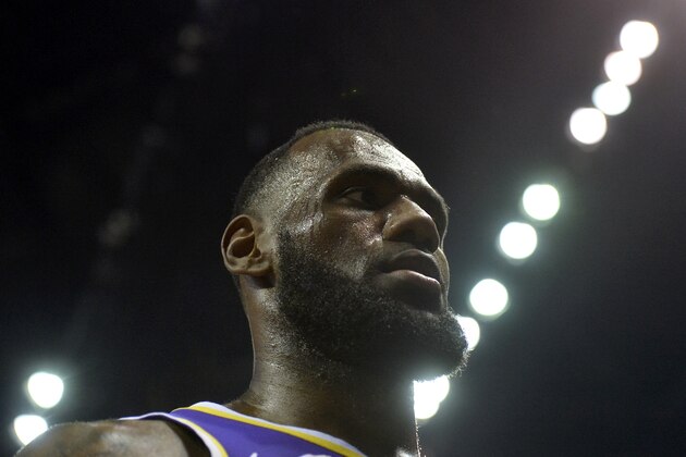 Los Angeles Lakers forward LeBron James walks off of the court after the first half of an NBA basketball game against the Memphis Grizzlies Monday, Feb. 25, 2019, in Memphis, Tenn. (AP Photo/Brandon Dill)
