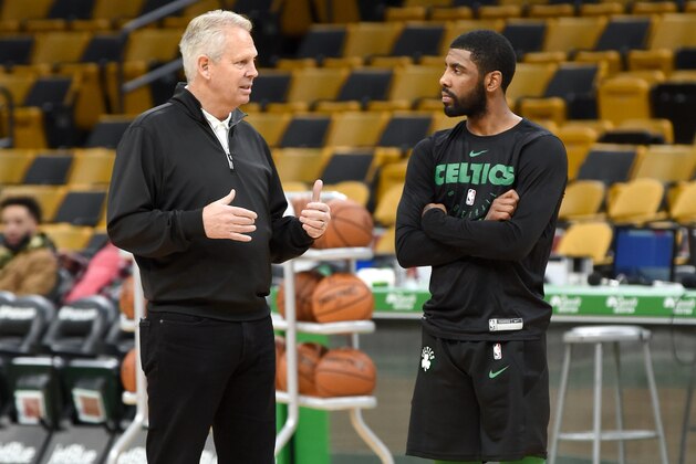 BOSTON, MA - NOVEMBER 17: General Manager Danny Ainge and Kyrie Irving #11 of the Boston Celtics talk before the game against the Utah Jazz on November 17, 2018 at the TD Garden in Boston, Massachusetts. NOTE TO USER: User expressly acknowledges and agrees that, by downloading and/or using this photograph, user is consenting to the terms and conditions of the Getty Images License Agreement. Mandatory Copyright Notice: Copyright 2018 NBAE (Photo by Steve Babineau/NBAE via Getty Images)