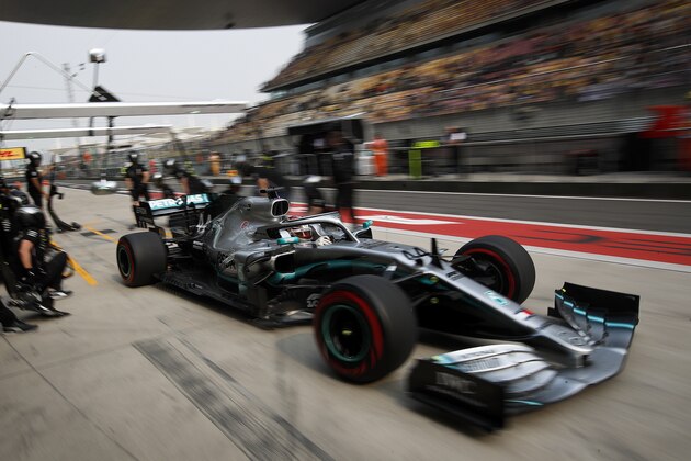 Mercedes driver Lewis Hamilton of Britain steers his car out of the pit-lane during the second practice session for the Chinese Formula One Grand Prix at the Shanghai International Circuit in Shanghai, China, Friday, April 12, 2019. (AP Photo/Andy Wong)