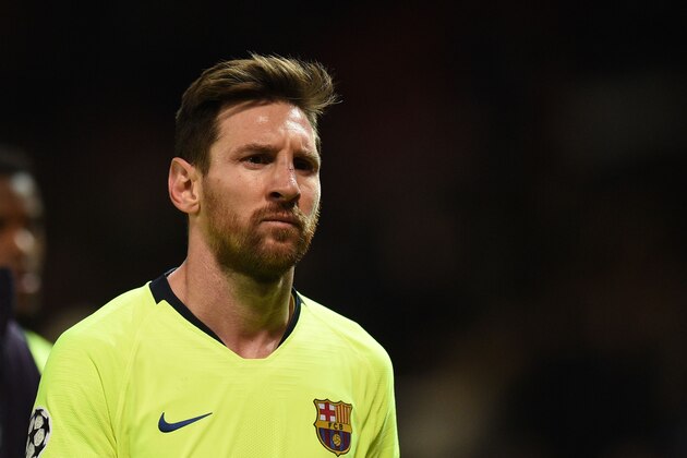 Barcelona's Argentinian forward Lionel Messi leaves the pitch after winning the UEFA Champions league first leg quarter-final football match between Manchester United and Barcelona at Old Trafford in Manchester, north west England, on April 10, 2019. (Photo by Oli SCARFF / AFP)        (Photo credit should read OLI SCARFF/AFP/Getty Images)