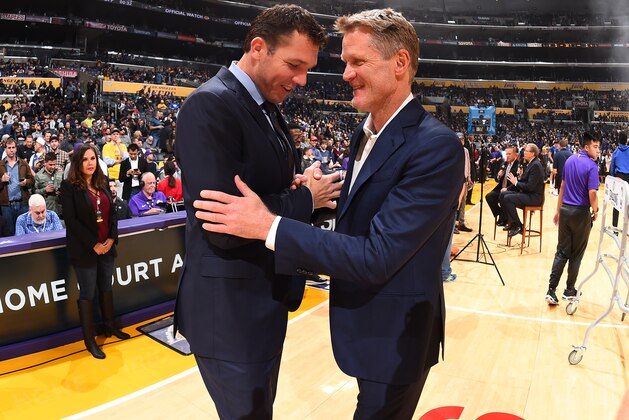 LOS ANGELES, CA - NOVEMBER 29: Head Coaches Luke Walton of the Los Angeles Lakers and Steve Kerr of the Golden State Warriors talk before the game on November 29, 2017 at STAPLES Center in Los Angeles, California. NOTE TO USER: User expressly acknowledges and agrees that, by downloading and/or using this Photograph, user is consenting to the terms and conditions of the Getty Images License Agreement. Mandatory Copyright Notice: Copyright 2017 NBAE (Photo by Andrew D. Bernstein/NBAE via Getty Images)