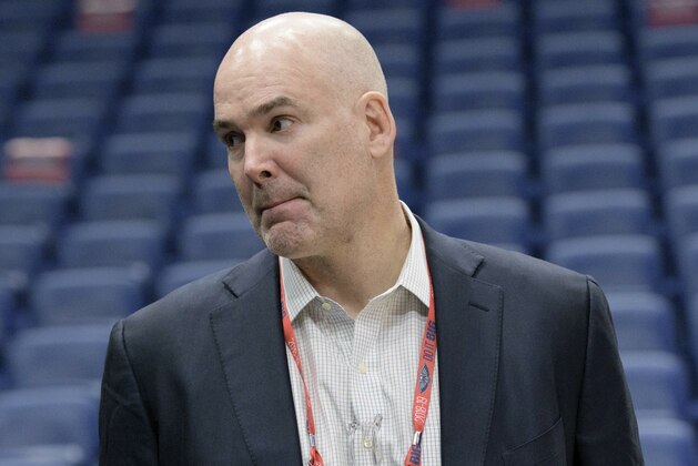 New Orleans Pelicans acting general manager Danny Ferry watches before the first half of an NBA basketball game against the Los Angeles Lakers in New Orleans, La. Saturday, Feb. 23, 2019. (AP Photo/Matthew Hinton)
