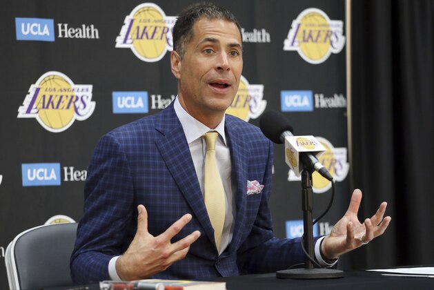 FILE - In this July 11, 2018, file photo, Los Angeles Lakers general manager Rob Pelinka speaks at a news conference at the NBA basketball team's headquarters in El Segundo, Calif. The  Lakers say they have mutually agreed to part ways with coach Luke Walton after three losing seasons. Pelinka announced Walton's departure Friday, April 12, 2019. (AP Photo/Reed Saxon, File)