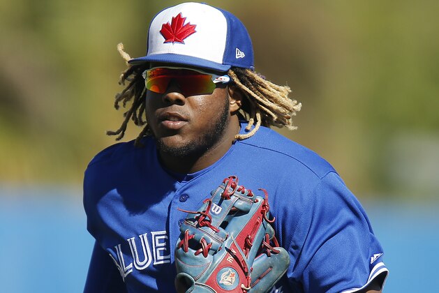 DUNEDIN, FLORIDA - MARCH 06:  Vladimir Guerrero Jr. #27 of the Toronto Blue Jays in action against the Philadelphia Phillies during the Grapefruit League spring training game at Dunedin Stadium on March 06, 2019 in Dunedin, Florida. (Photo by Michael Reaves/Getty Images)