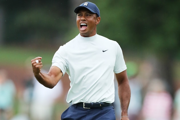 AUGUSTA, GEORGIA - APRIL 12: Tiger Woods of the United States celebrates after making a putt for birdie on the 15th green during the second round of the Masters at Augusta National Golf Club on April 12, 2019 in Augusta, Georgia. (Photo by David Cannon/Getty Images)