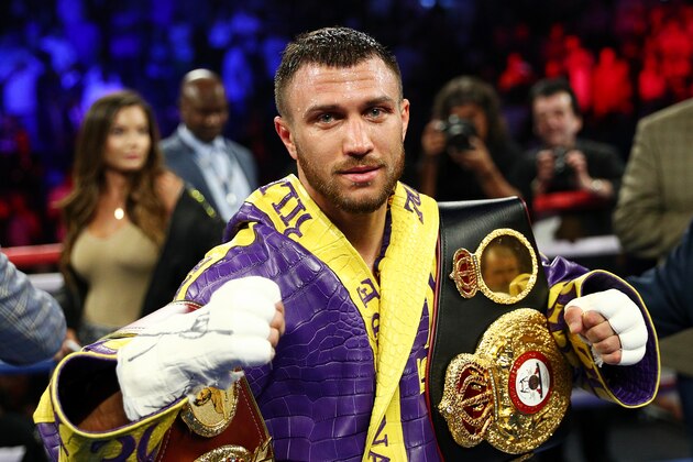 LOS ANGELES, CALIFORNIA - APRIL 12: Vasiliy Lomachenko celebrates defending his WBA/WBO lightweight titles after knocking out Anthony Crolla at Staples Center on April 12, 2019 in Los Angeles, California. (Photo by Yong Teck Lim/Getty Images)