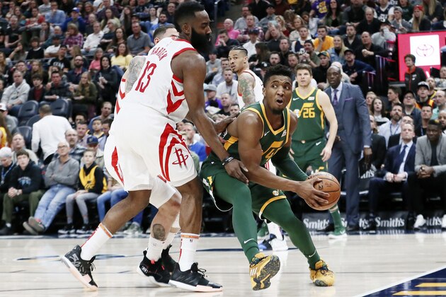 SALT LAKE CITY, UT - FEBRUARY 2: Donovan Mitchell #45 of the Utah Jazz handles the ball against the Houston Rockets on February 2, 2019 at Vivint Smart Home Arena in Salt Lake City, Utah. NOTE TO USER: User expressly acknowledges and agrees that, by downloading and/or using this Photograph, user is consenting to the terms and conditions of the Getty Images License Agreement. Mandatory Copyright Notice: Copyright 2019 NBAE (Photo by Chris Elise/NBAE via Getty Images)