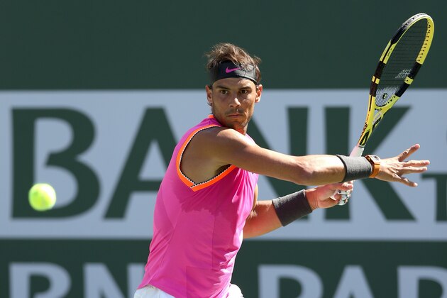 INDIAN WELLS, CALIFORNIA - MARCH 15: Rafael Nadal of Spain returns a shot to Karen Khachanov of Russia during the quarterfinals of the BNP Paribas Open at the Indian Wells Tennis Garden on March 15, 2019 in Indian Wells, California. (Photo by Matthew Stockman/Getty Images)