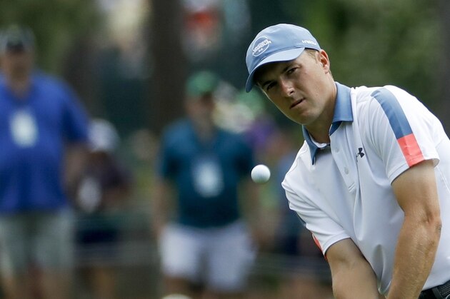 Jordan Spieth hits to the third green during the first round for the Masters golf tournament Thursday, April 11, 2019, in Augusta, Ga. (AP Photo/Matt Slocum)