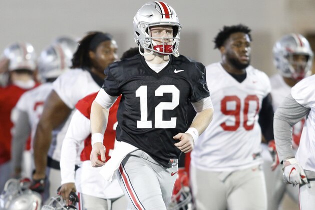Ohio State University quarterback Matthew Baldwin runs through a drill during an NCAA college football practice in Columbus, Ohio, Wednesday, March 6, 2019. (AP Photo/Paul Vernon)