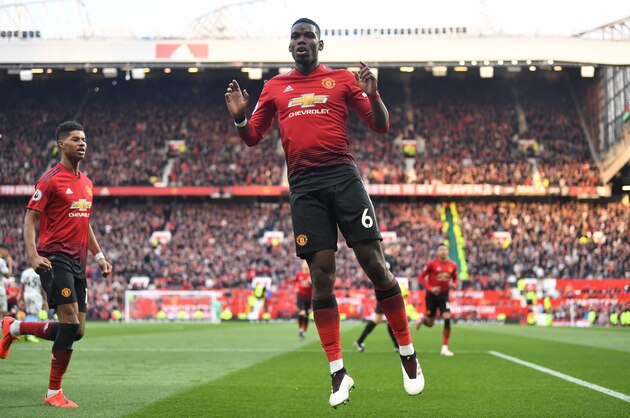 MANCHESTER, ENGLAND - APRIL 13:  Paul Pogba of Manchester United celebrates after scoring his team's second goal from a penalty during the Premier League match between Manchester United and West Ham United at Old Trafford on April 13, 2019 in Manchester, United Kingdom. (Photo by Michael Regan/Getty Images)